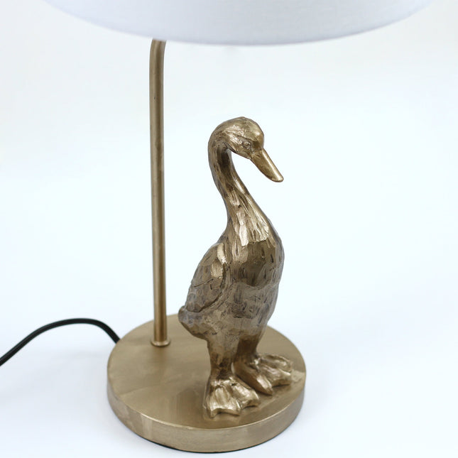 Duck Standing Table Lamp with Cream Linen Shade for Elegant Decor.