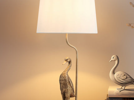 Duck Standing Table Lamp with Cream Linen Shade for Elegant Decor.