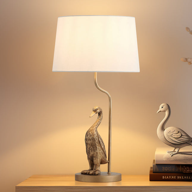 Duck Standing Table Lamp with Cream Linen Shade for Elegant Decor.