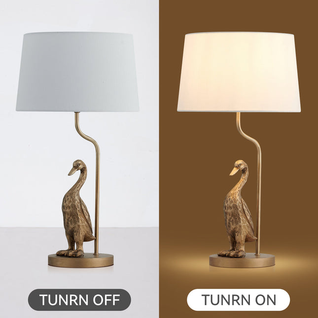Duck Standing Table Lamp with Cream Linen Shade for Elegant Decor.
