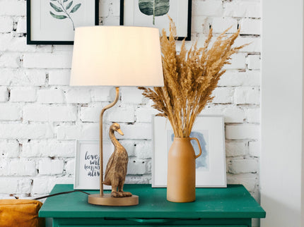 Duck Standing Table Lamp with Cream Linen Shade for Elegant Decor.