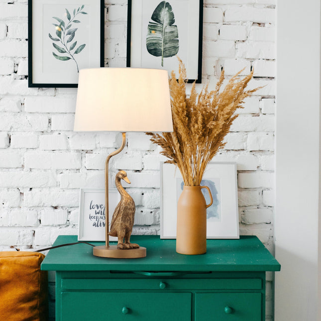 Duck Standing Table Lamp with Cream Linen Shade for Elegant Decor.