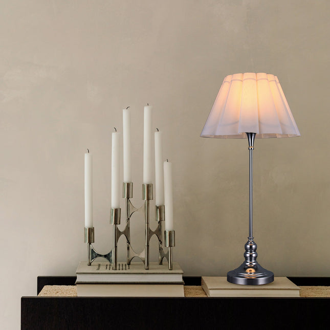 Giselle Table Lamp with Chrome Base and White Linen Shade.