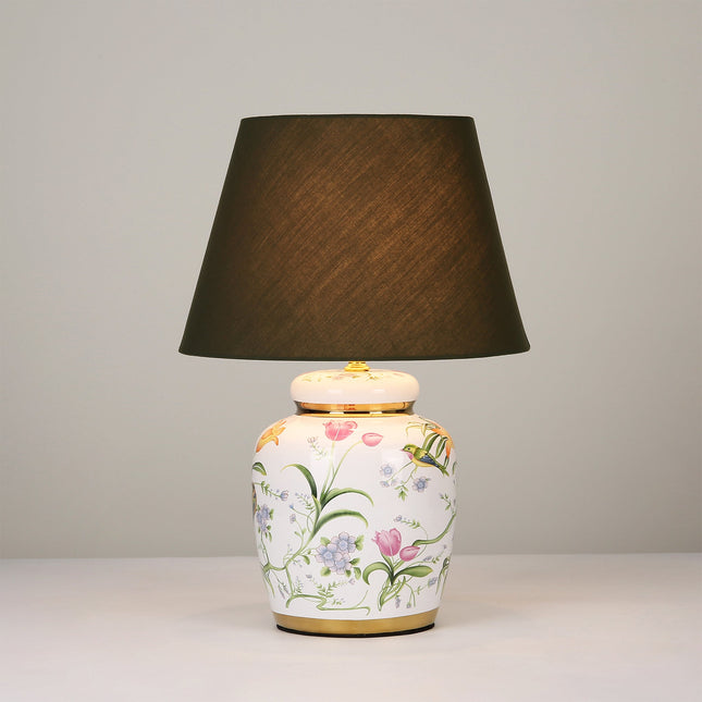 Circe Ceramic Table Lamp with White Base and Green Fabric Shade.