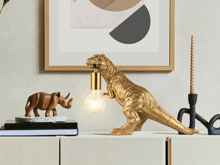 T-Rex Bite Table Lamp with Gold Finish and Unique Dinosaur Design.