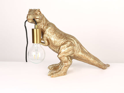 T-Rex Bite Table Lamp with Gold Finish and Unique Dinosaur Design.
