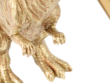 T-Rex Bite Table Lamp with Gold Finish and Unique Dinosaur Design.