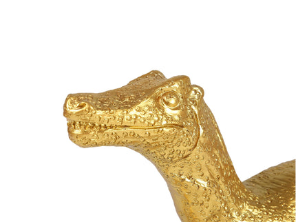 Velociraptor Grip Table Lamp with Gold Finish for Unique Home Decor.