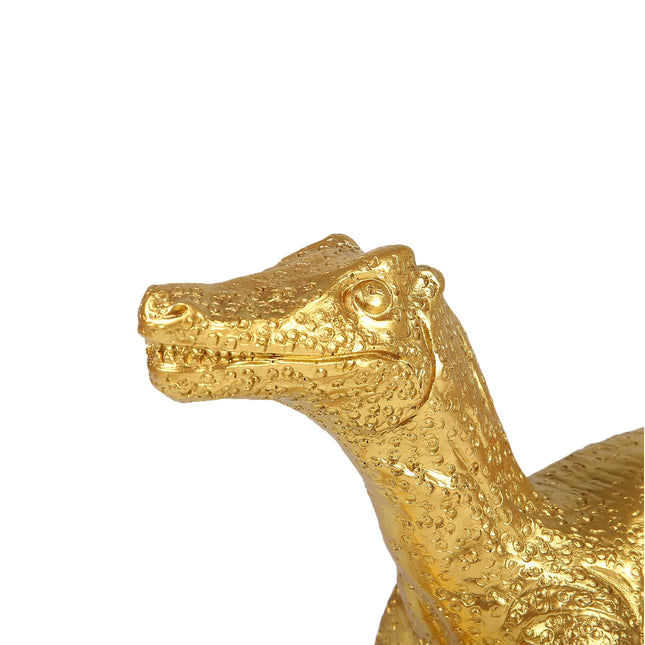 Velociraptor Grip Table Lamp with Gold Finish for Unique Home Decor.