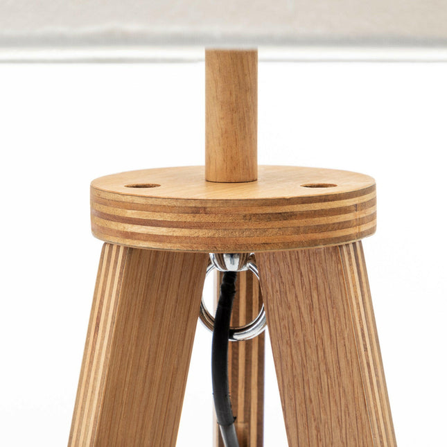 Natural Wooden Tripod Floor Lamp w/ Round Wood Shelf and Off White Linen Shade.